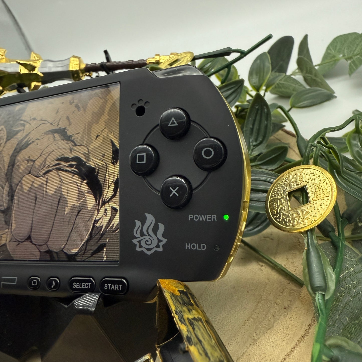 PSP 3000 in schwarz gold gemoddet